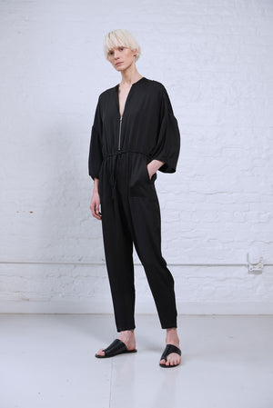 Black kimono sleeve satin jumpsuit with pockets