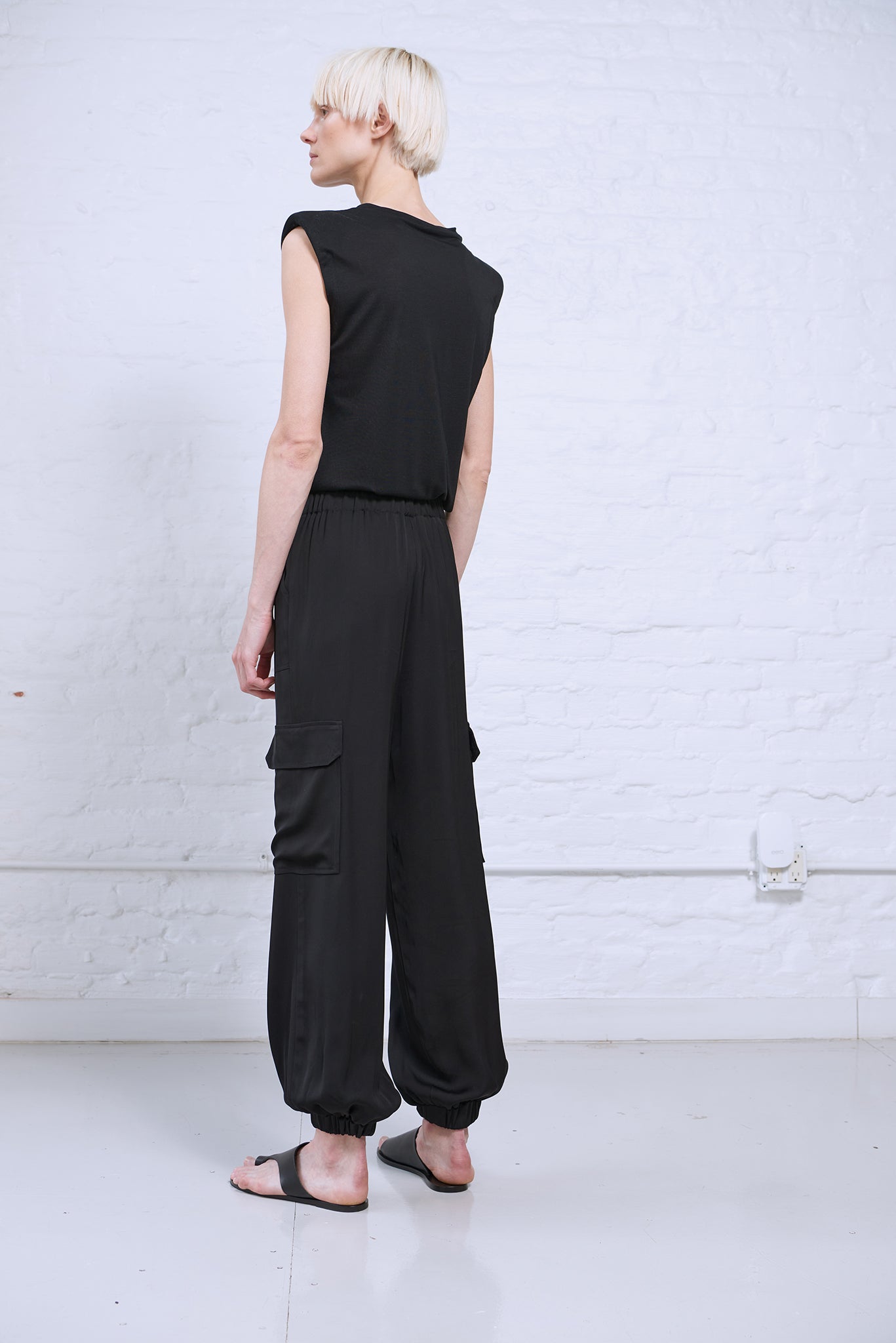 Women's satin cargo pant with elastic waist black back view